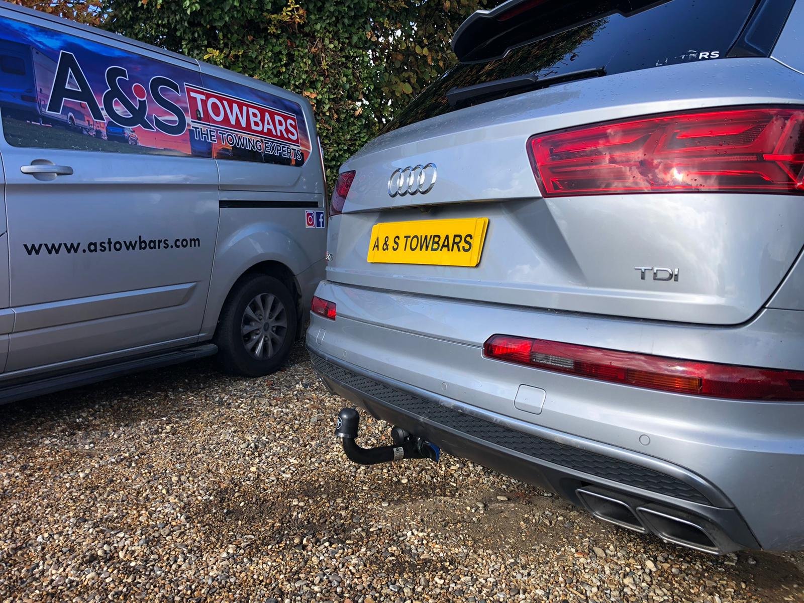 a&s towbars number plate and close up of fitted towbar on grey audi